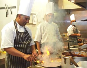 Cats in the hats: the Cafe India kitchen team keep it cool