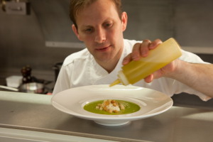 Fabrice Bouteloup applies the finishing touches to a dish