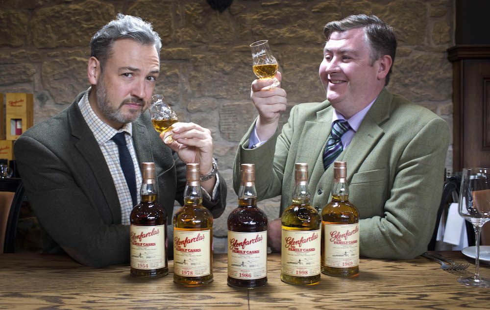 James Rusk and George Grant celebrate the opening of the Glenfarclas private dining room at Hutchesons.