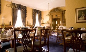 The Dining Room at The Royal Scots Club overlooks Queen Street Gardens.