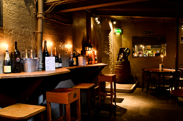 Enjoy seafood in the wine cellar at Whighams.