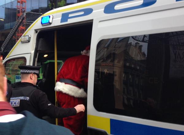 Police assured bystanders they were confident that they had not lifted the real Sant and Christmas is safe. Pic via Mike Wade.