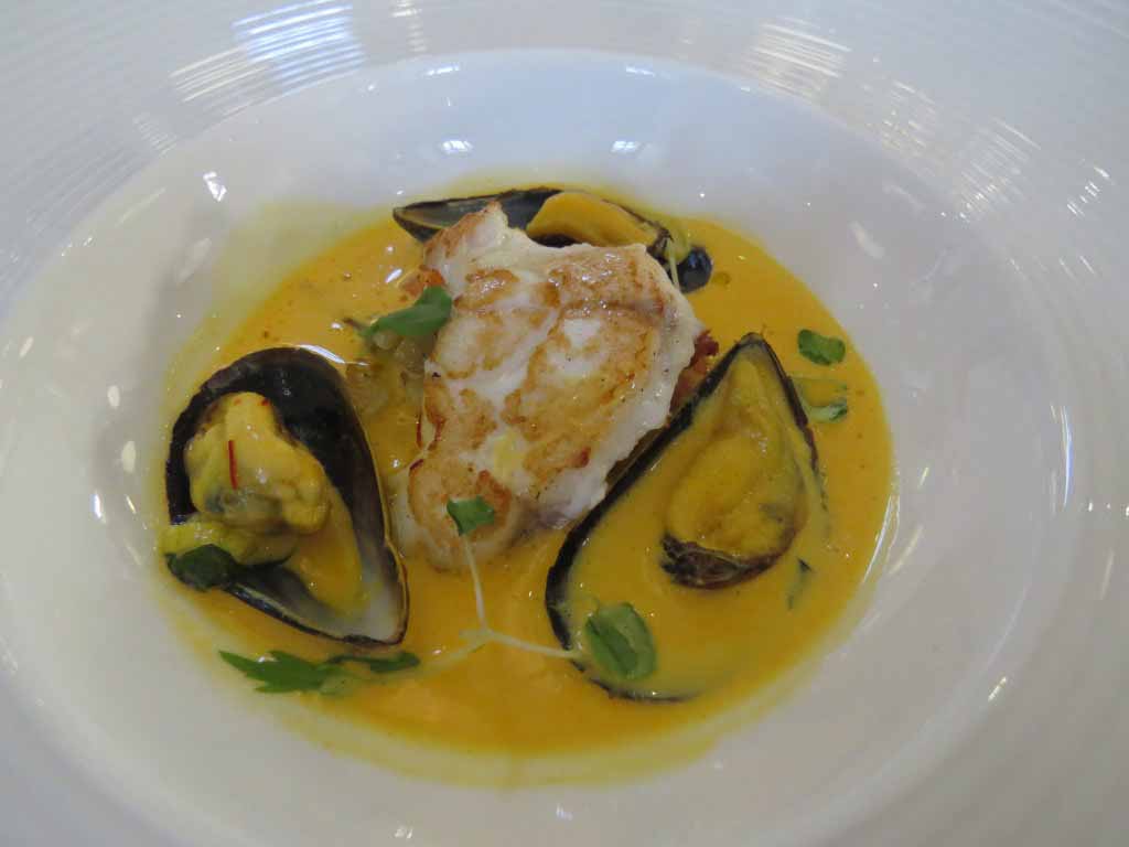 Fish course: Peterhead pan-roasted monkfish with East Lothian root vegetable and saffron broth and blue shell Shetland mussels