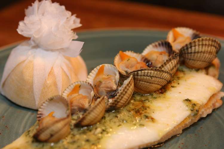 Whole lemon sole, cockles, anchovy and parsley butter from Monteiths' new menu.