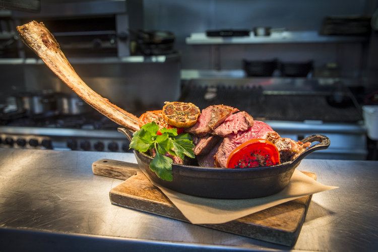 Tackle a Tomahawk at The Butchershop Bar and Grill.