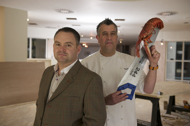 Paul Brennan, Stuart Muir and new friend start renovations on Dine with Stuart Muir. Pic: Tony Marsh.