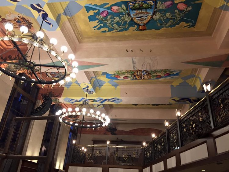 Check the frescoes on the ceiling at Bavaria Brauhaus.