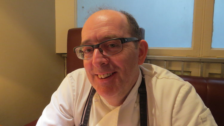 John in his restaurant, Red Onion.