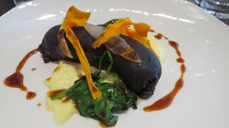 Butter roasted boudin noir with mash potato, apple puree and a sweet mustard and red wine sauce.