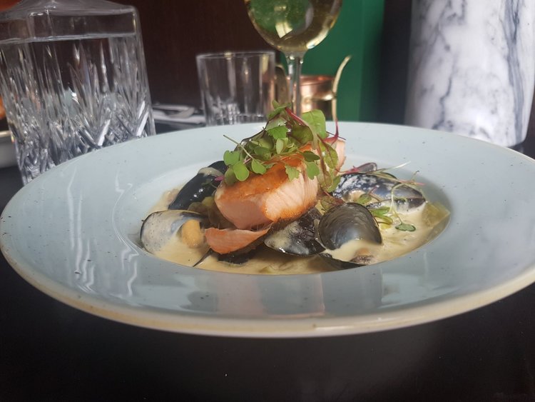 Pan-seared salmon with smoked mussels, Ayrshire bacon & creamed leeks: on the menu at Birdtree and Bellfish. 