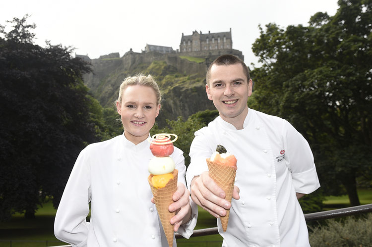 Pic Greg Macvean - 02/08/2016 - 07971 826 457 Head Chef Brian Grigor and Pastry Chef Mikaela Wright Head Chef Brian Grigor of Michelin Starred Number One at The Balmoral launches this weekend's Foodies Festival Edinburgh at Inverleith Park 5th - 7th August Head Chef Brian Grigor of Michelin-starred Number One at The Balmoral joined Foodies Festival, ahead of his demo in the Chefs Theatre, to officially launch this weekend's festival with his summer inspired icecream flavours (summer berries and smoked salmon & horseradish). After a record breaking 10th anniversary festival last year, which welcomed over 38,000 visitors, Foodies Festival has once again increased the size of its Inverleith Park festival, making way for more award-winning producers, street food from around the world, food & drink masterclasses and foodie fun - promising visitors the tastiest day out in Scotland. Highlights of this year's festival include Scotland's Michelin-star and top chefs cooking in the Chefs Theatre, a Vintage Tea Tent, Artisan Producers Market, Giant Pimm's Teapot and Rum Bus, Street Food Avenue, Cake & Bake Theatre, Kids Cookery School and a Live Music Stage. - ENDS - Full media release attached and high res images here https://goo.gl/zaeEDT For further information please contact Gary Anderson at gary@lanyardmedia.com 07564 444002