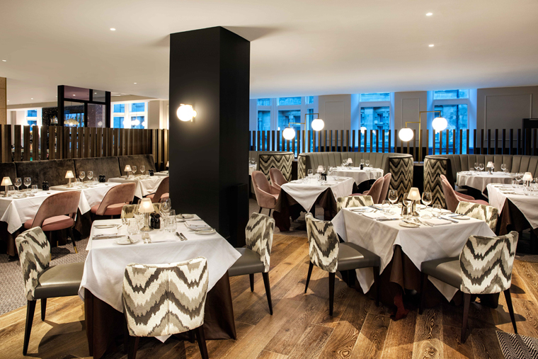The Marco Pierre White Steakhouse has a smart dining room.
