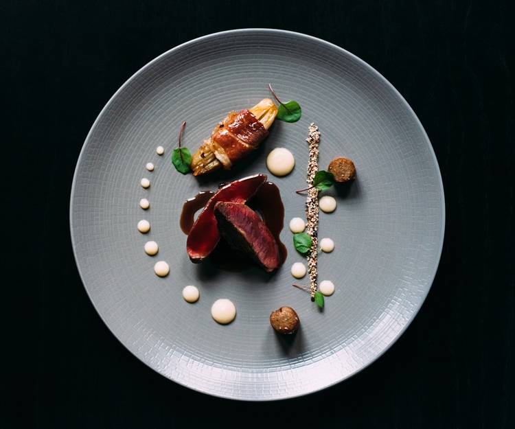 Roast wood pigeon breast, game bird boudin, braised endive and hazelnut crunch. Photo by: Andrew Rae (www.andrewrae.com)