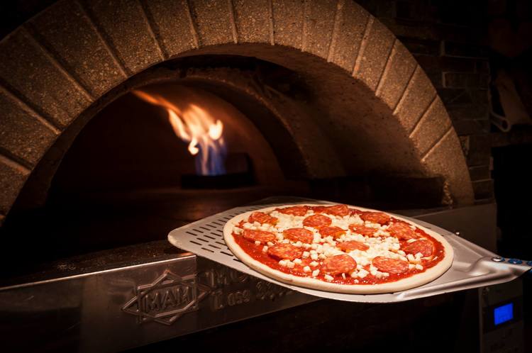Ciao Roma: freshly baked pizza coming up. Pic: restaurant Facebook.