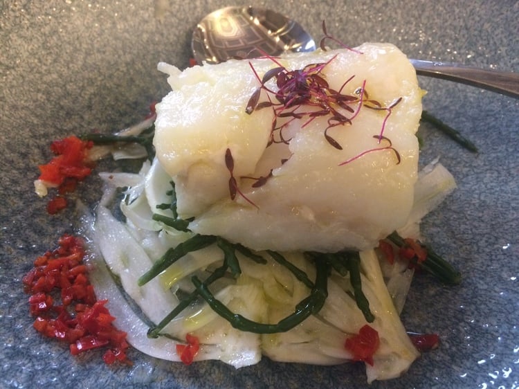 Cod poached in cold pressed olive oil with fennel, samphire and chilli.