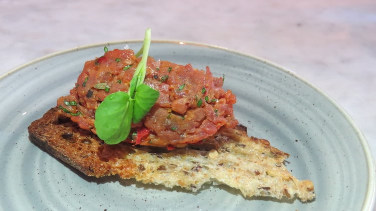 Steak tartare flavoured with capers, mustard and harissa. The beef is coarse cut which gave it a good texture. Great, punchy flavours from the condiments.