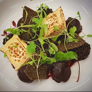 Crotin of goat's cheese with beetroot, pickled brambles and charcoal crackers from The Fox and Willow.